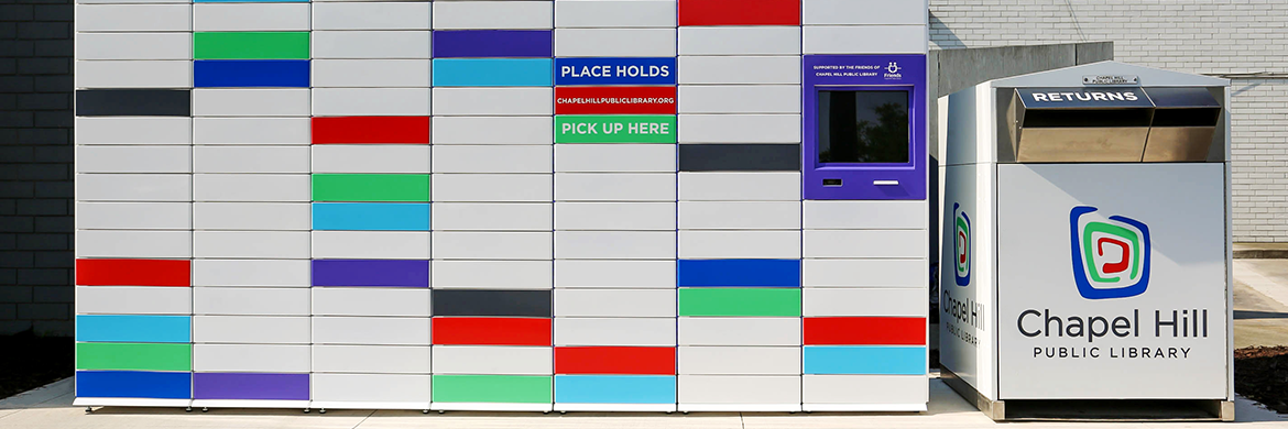 Colorful tiles and lockers at the University Place next to the returns station